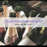 10 green and gold champagne bottles.